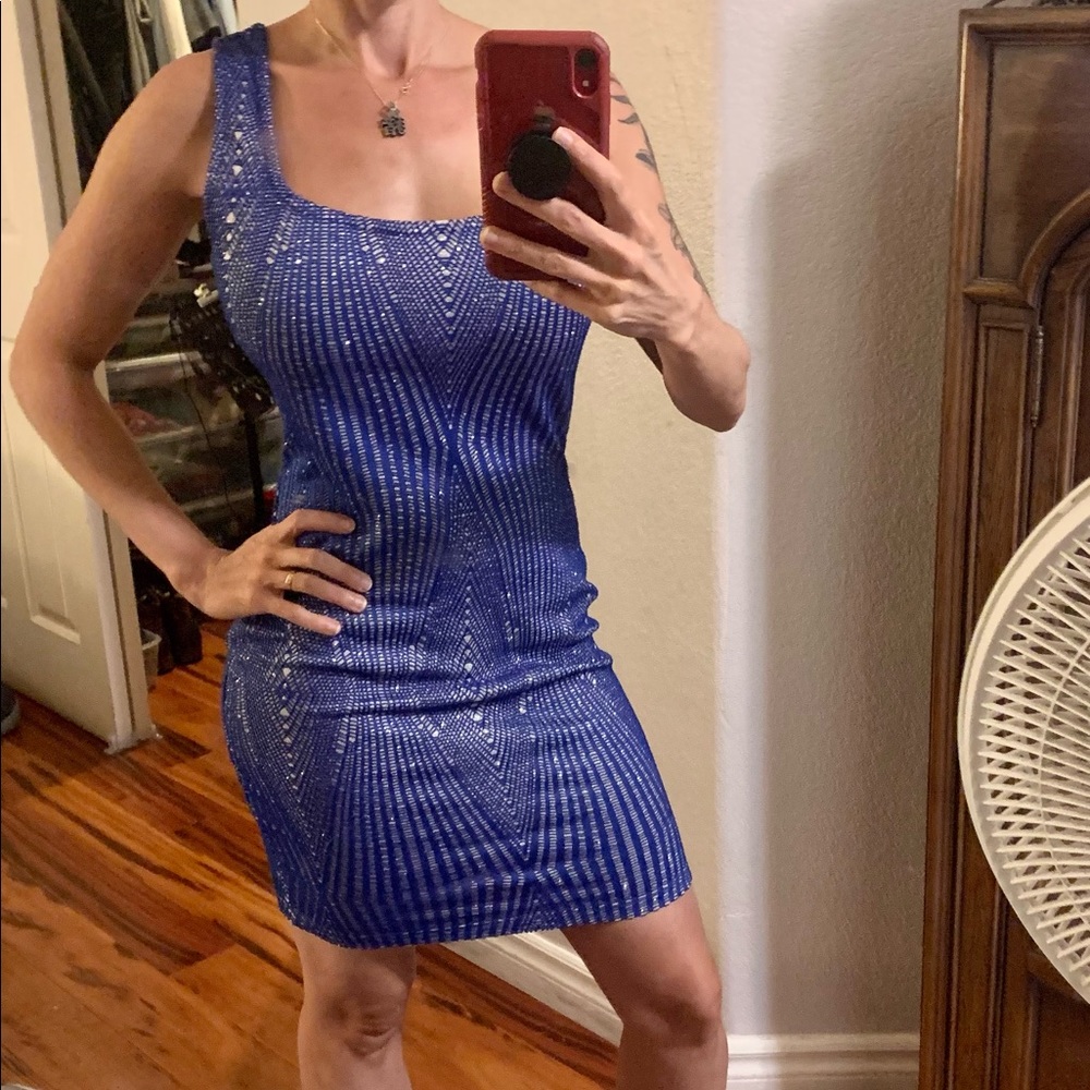 Dress M Haunted Monde like new. Sparkly silver